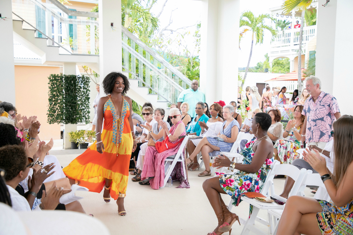 A model struts down catwalk during the 2019 Crucian Fashion Festival