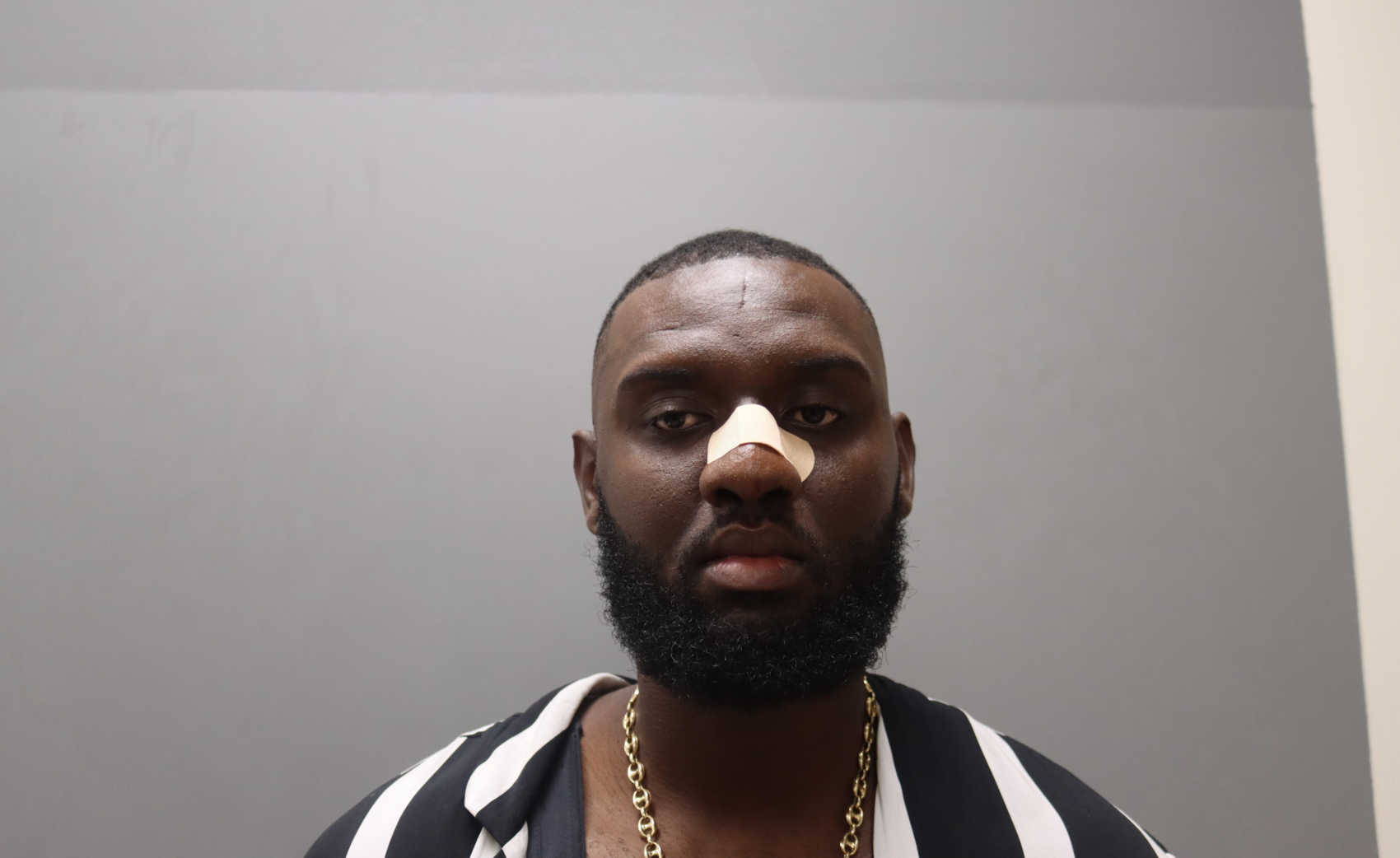 Mugshot of Ajani George.