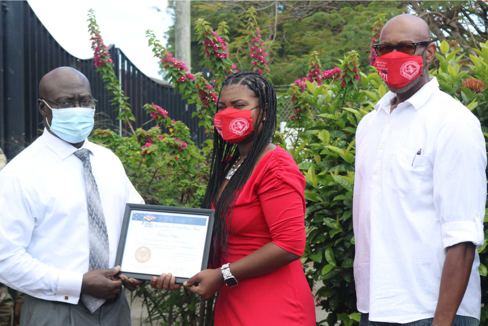 CHS Guidance Counselor Ancelma Elliot, center, receives Gen. Colin L. Powell Service Award from Our Community Salutes-Virgin Islands on June 24. Elliot is pictured with Beresford Edwards (L) of Our Commnunity Salutes-Virgin Islands and CHS Principal Yves