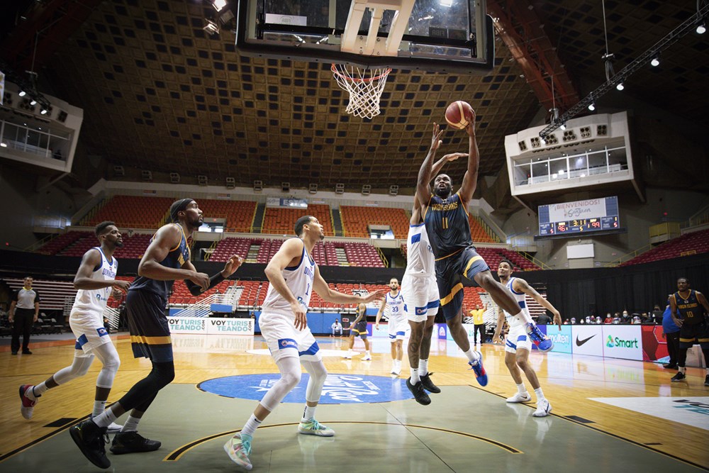 Ivan Aska (11), goes up for a lay-up in the loss versus the Dominican Republic on Friday, Feb. 19 2021.