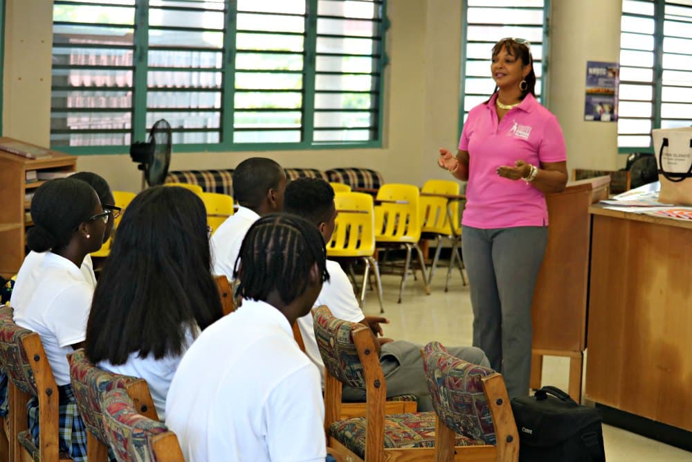 Department of Tourism Assistant Communications Director Sharon Rosario gives a presentation to students enrolled in the St. Croix Career & Technical Education Center's Academy of Hospitality & Tourism and the Academy of Finance.