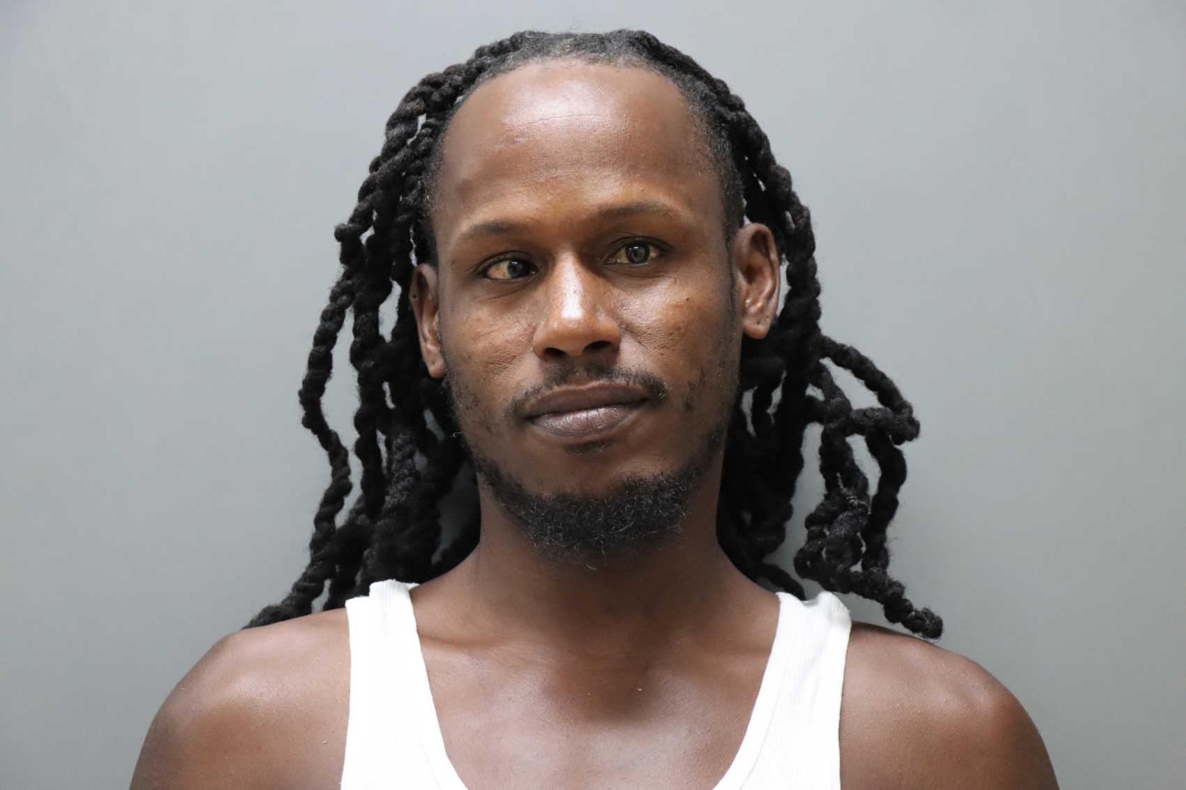 Mugshot of Dennison Etienne.