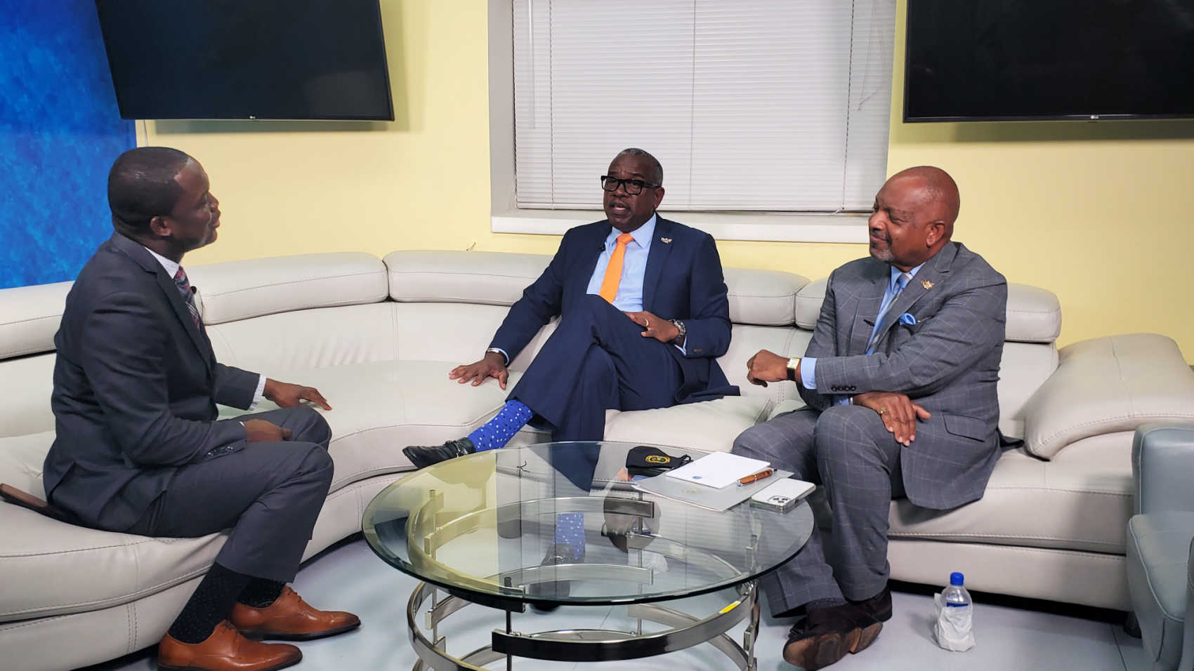 From left to right, V.I. Consortium Publisher Ernice Gilbert, Governor Albert Bryan, and Lieutenant Governor Tregenza Roach.