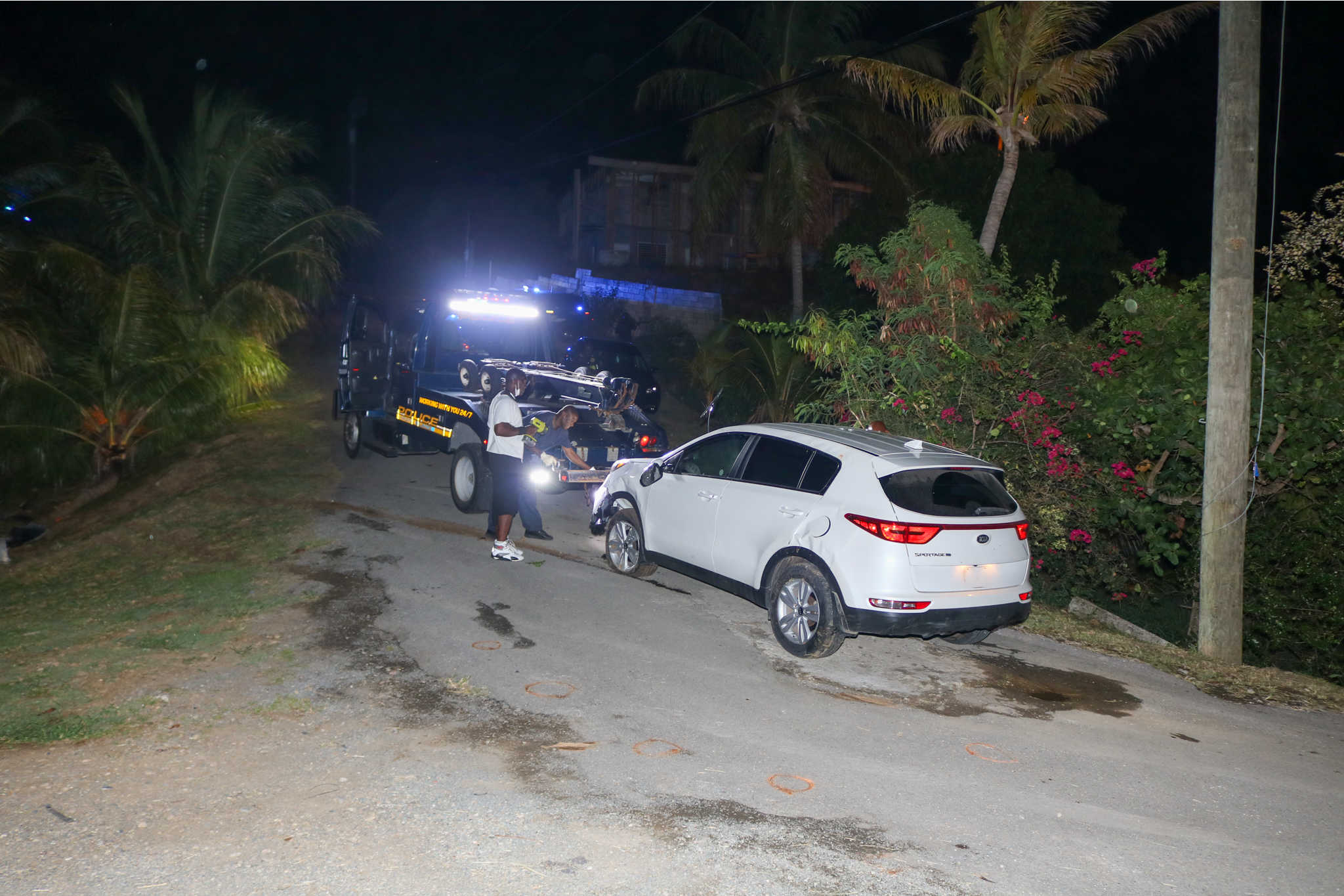 Police recovering stolen vehicle in Estate La Grange after chase resulted in four persons apprehended.