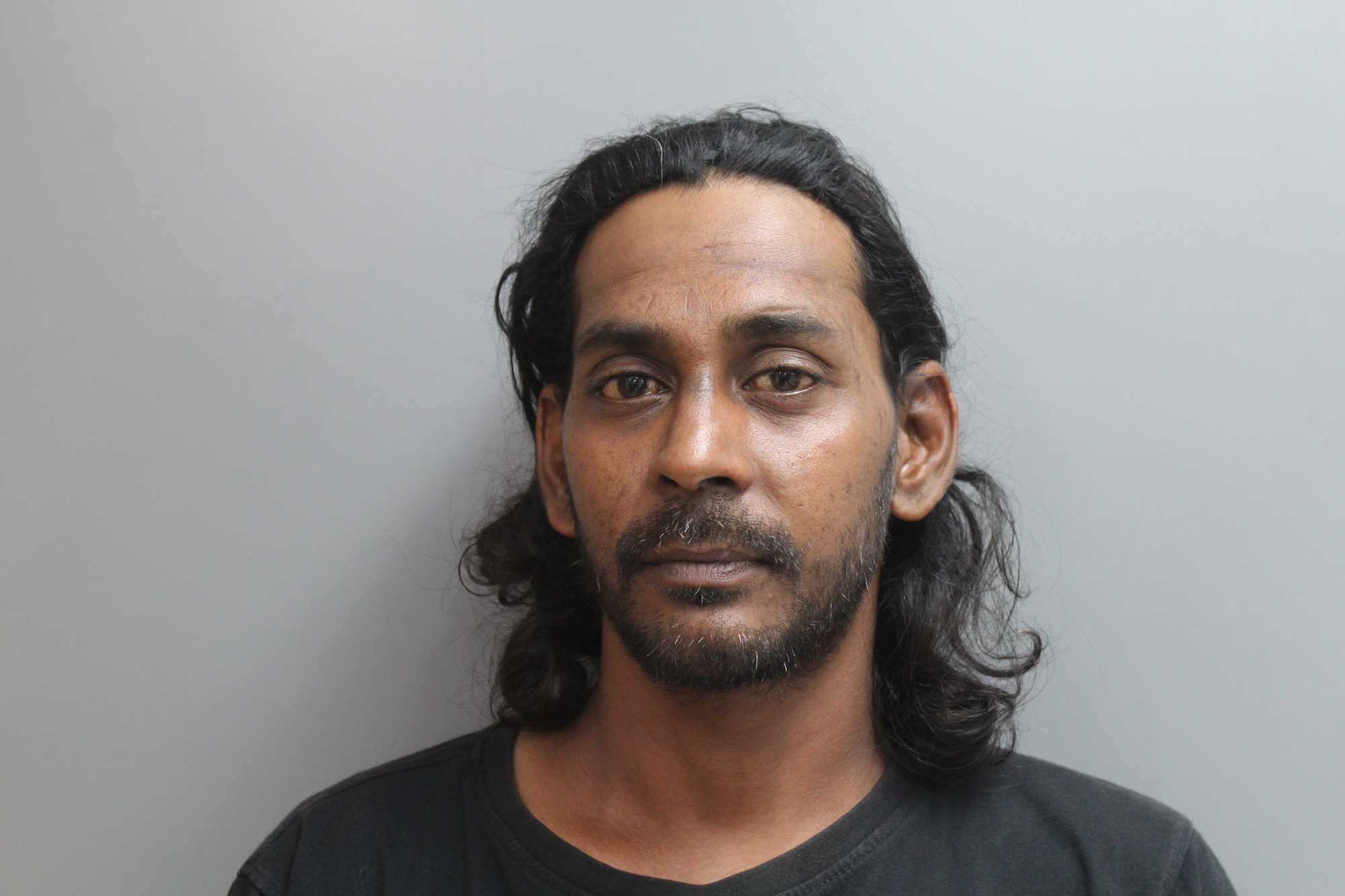 Mugshot of Sham Malaykhan.