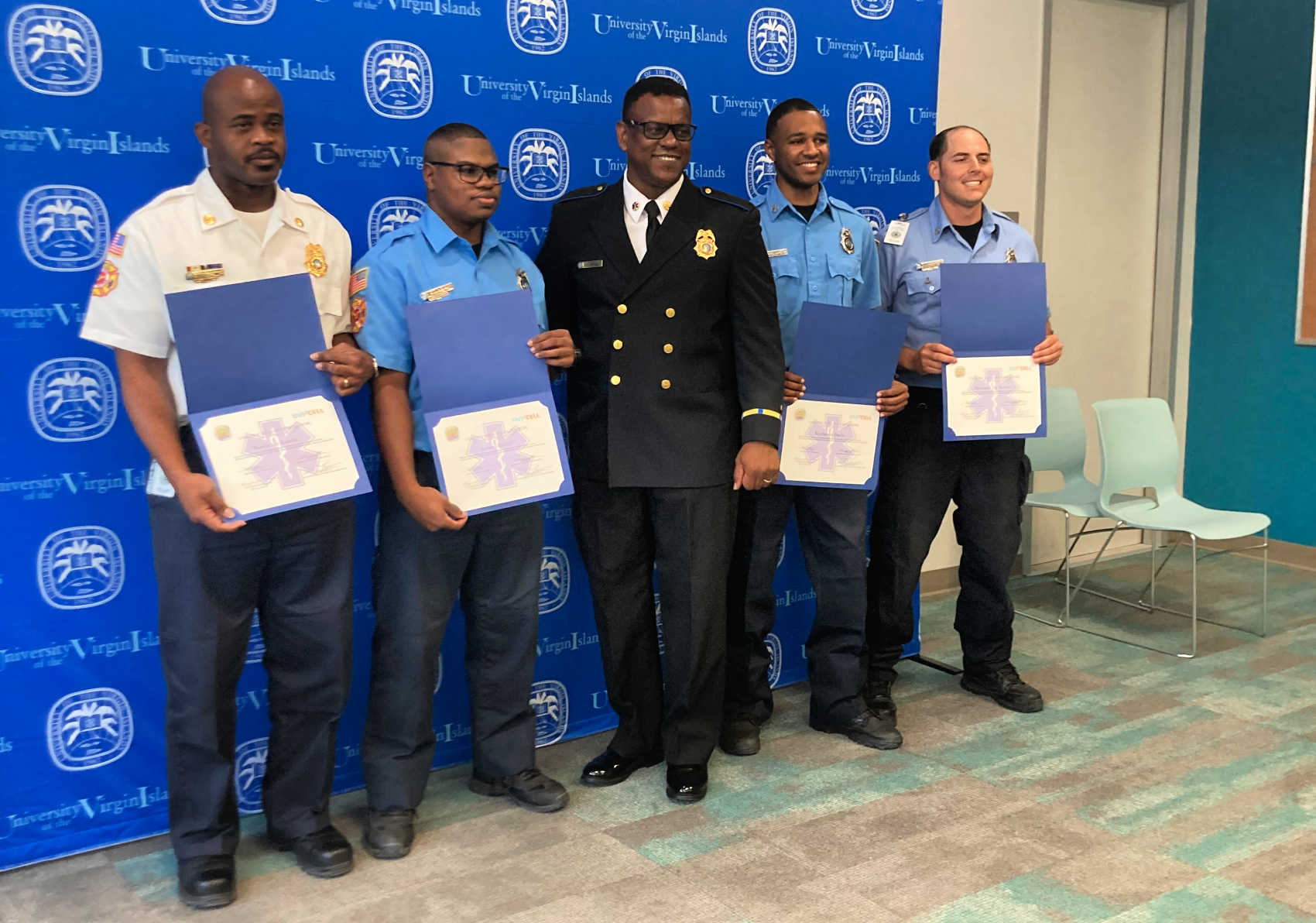 From left to right: Kevin de Lande, Amani Estrill, Robert Bryan-EMS Fire Chief, Norberto Davis and Michael De Sorbo