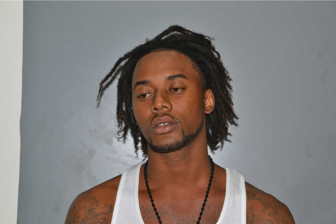 Mugshot of Acio Richards.
