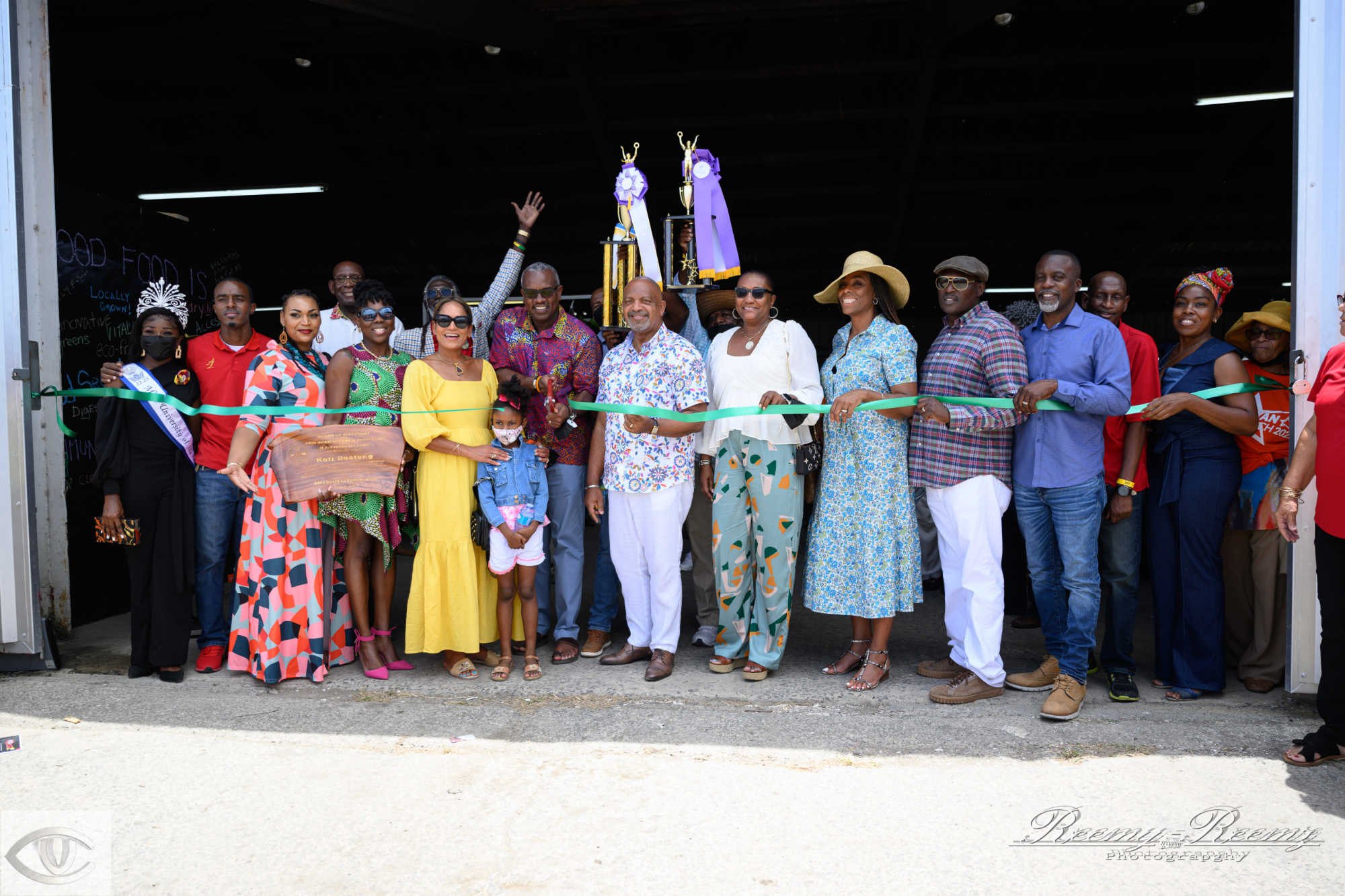 Local leaders cut ribbon following the opening ceremony of the Agricultural Fair on Saturday, May 28, 2022.