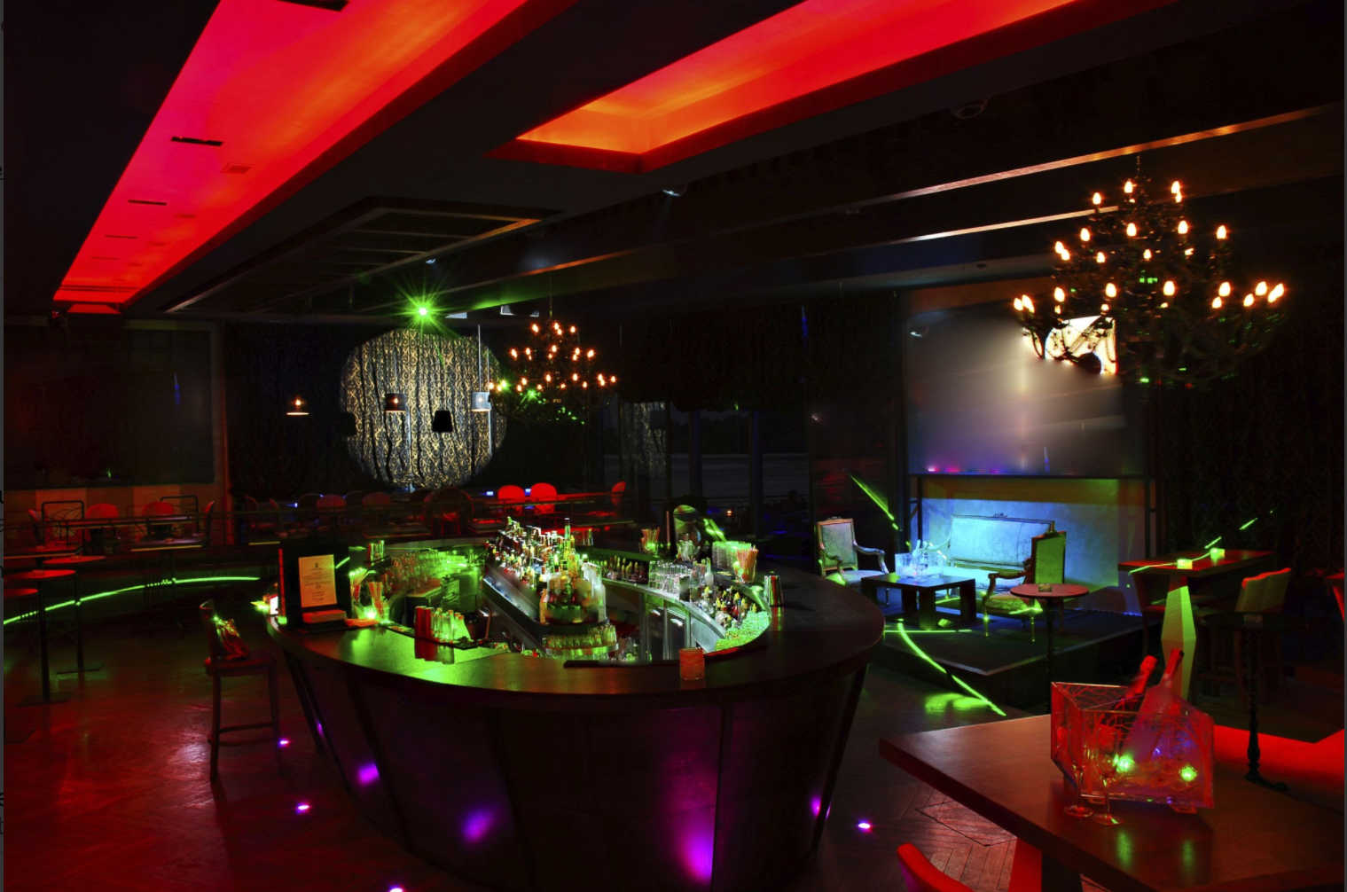 A cabaret provides entertainment in a club or restaurant setting while the audience eats or drinks at tables.