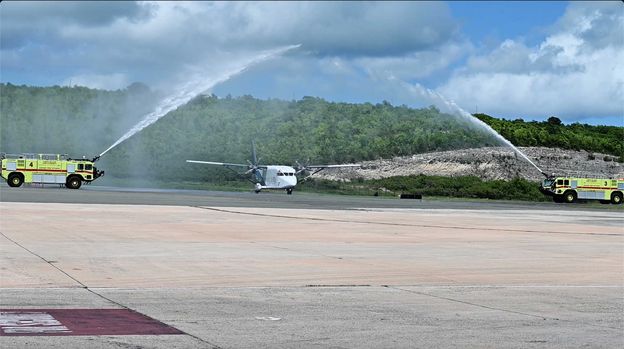 The V.I. Port Authority Fire Department performs a Water Salute for the arrival of the body of Senator Alicia "Chucky" Hansen on Tues. Oct. 17, 2023.