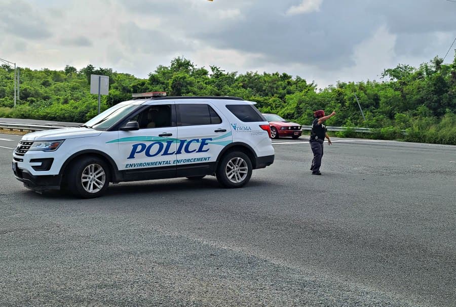 Law enforcement officers blocked a portion of the Melvin Evans Highway, heading west beginning at the Economic Development Authority's (EDA) Industrial Park intersection, as they investigated the homicide on Sunday, Sept. 13, 2020.