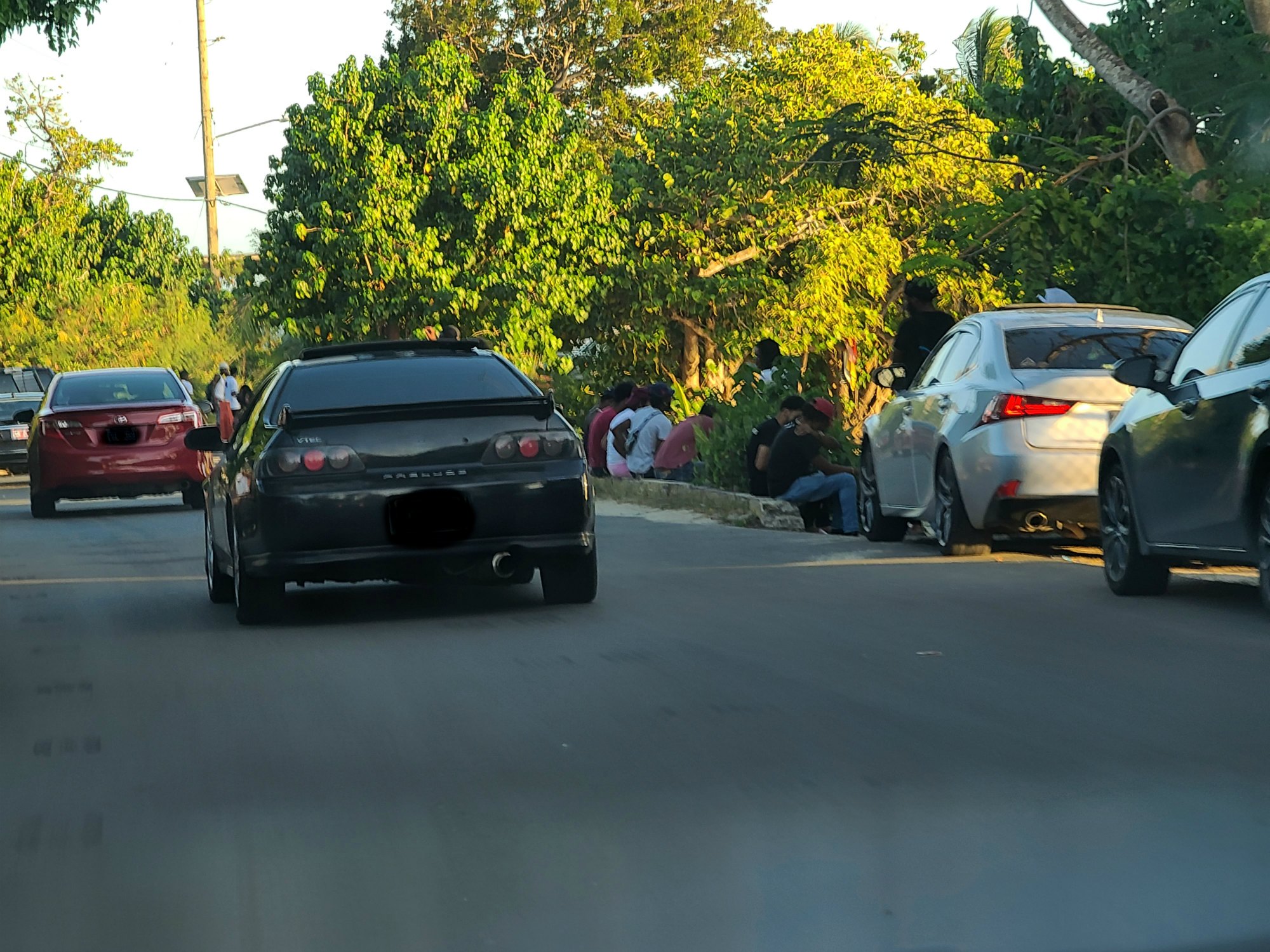 St. Croix residents gather on the side of the road of the popular Rainbow Beach in Frederiksted on Sunday, April 26.