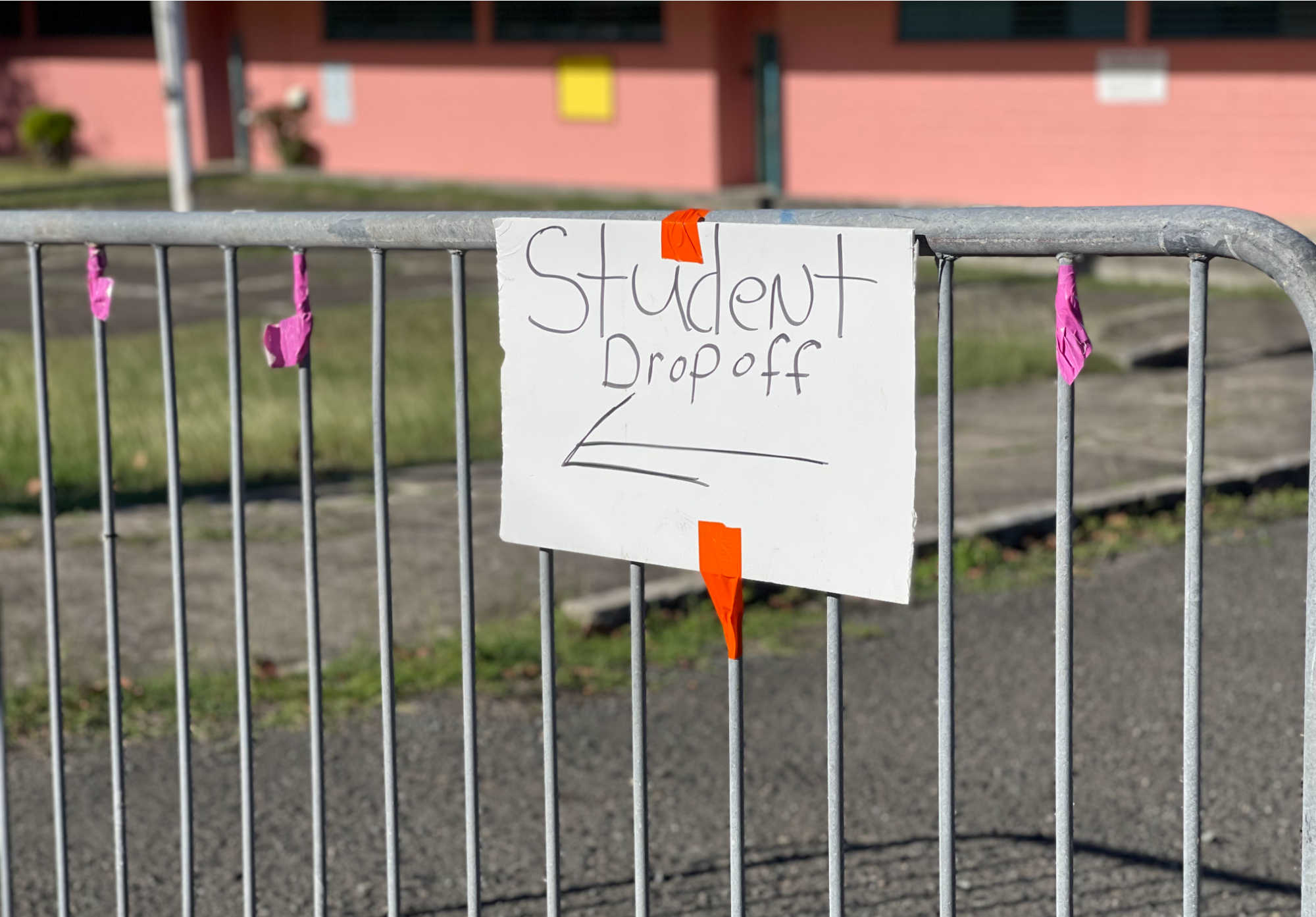 Student drop off sign at the Juanita Gardine K-8 School.