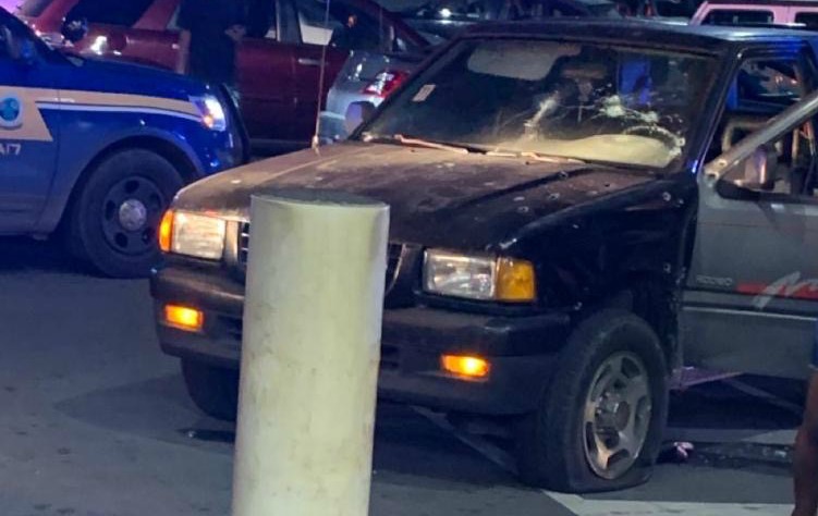 A vehicle damaged by gunshots. In it was the victim of Monday night's shooting, who survived the onslaught without life-threatening injuries, according to police.