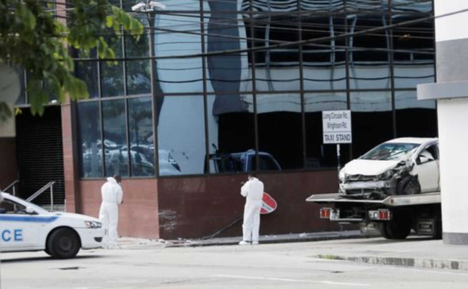 Scene of incident where three men, including two minors were shot from behind in Laventille, Trinidad, according to autopsies.