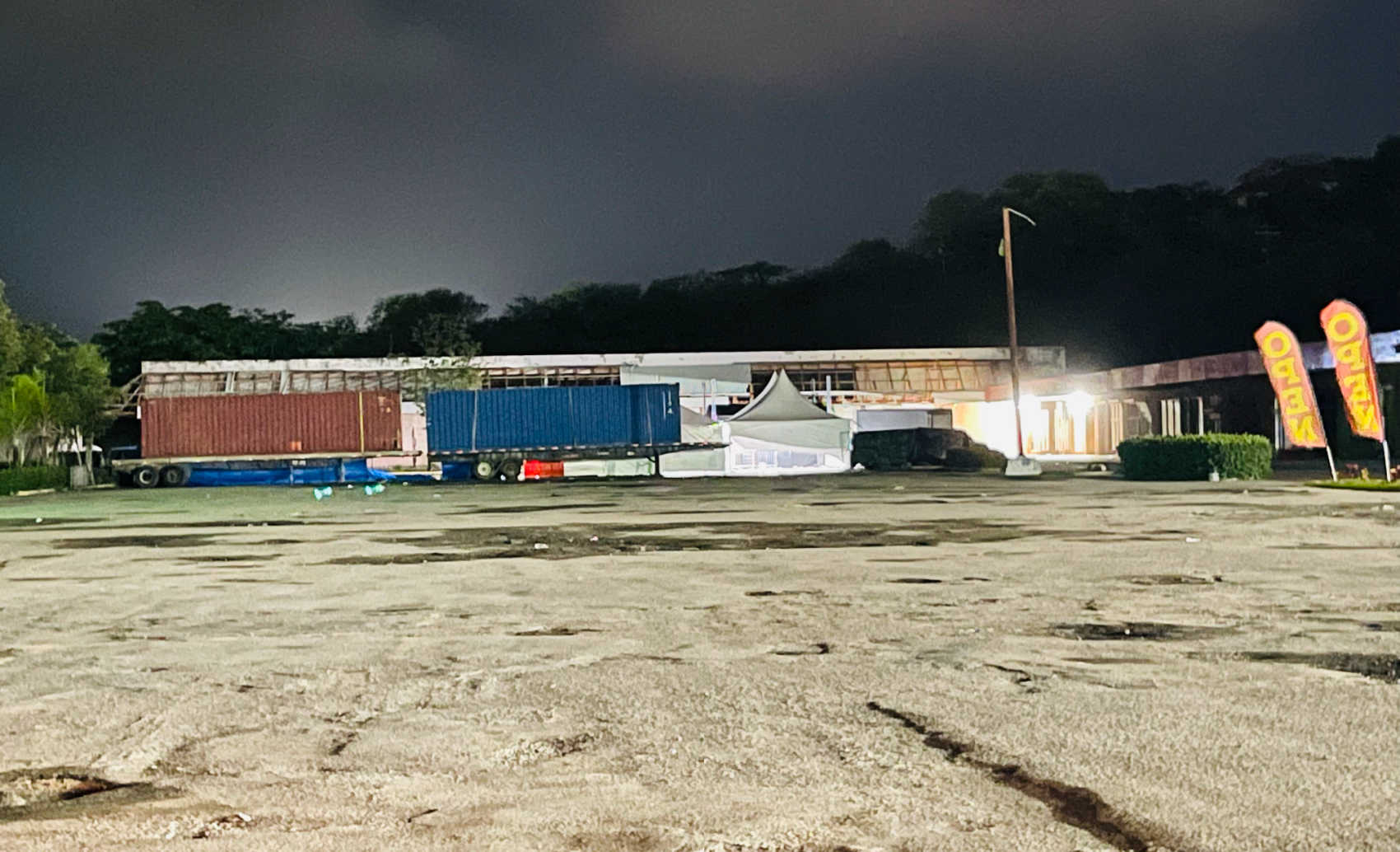 The La Reine Shopping Center Parking Lot during the wee hours of Sunday morning following a shooting incident that left a man and a woman injured.