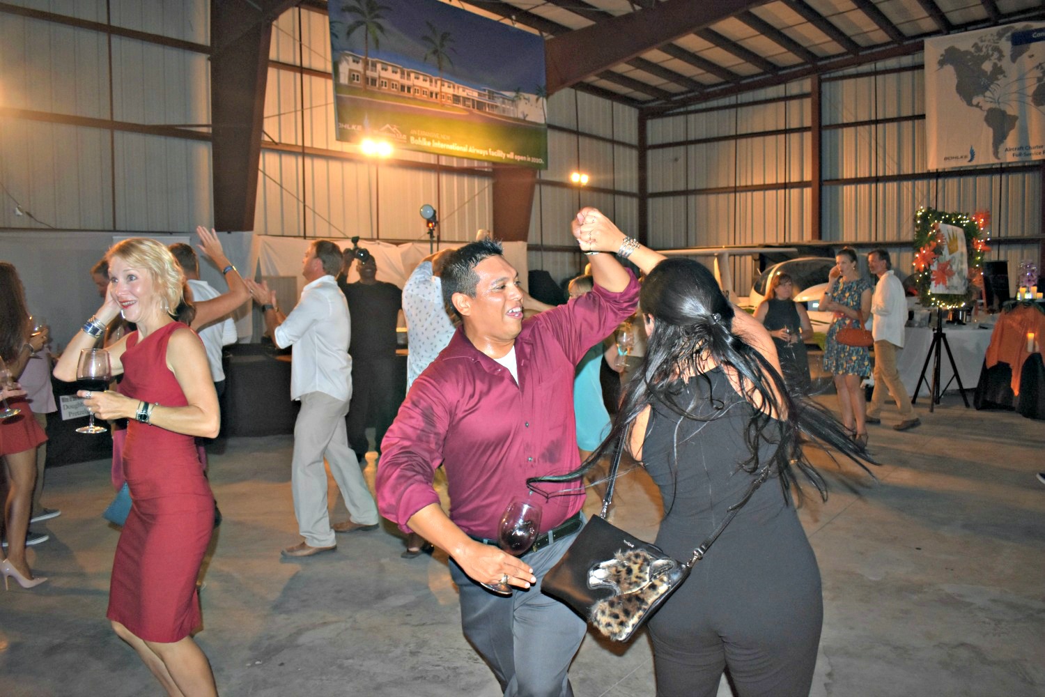 Couple dances at Wine in the Warehouse 2019, part of the St. Croix Foundation's Food & Wine Experience event.