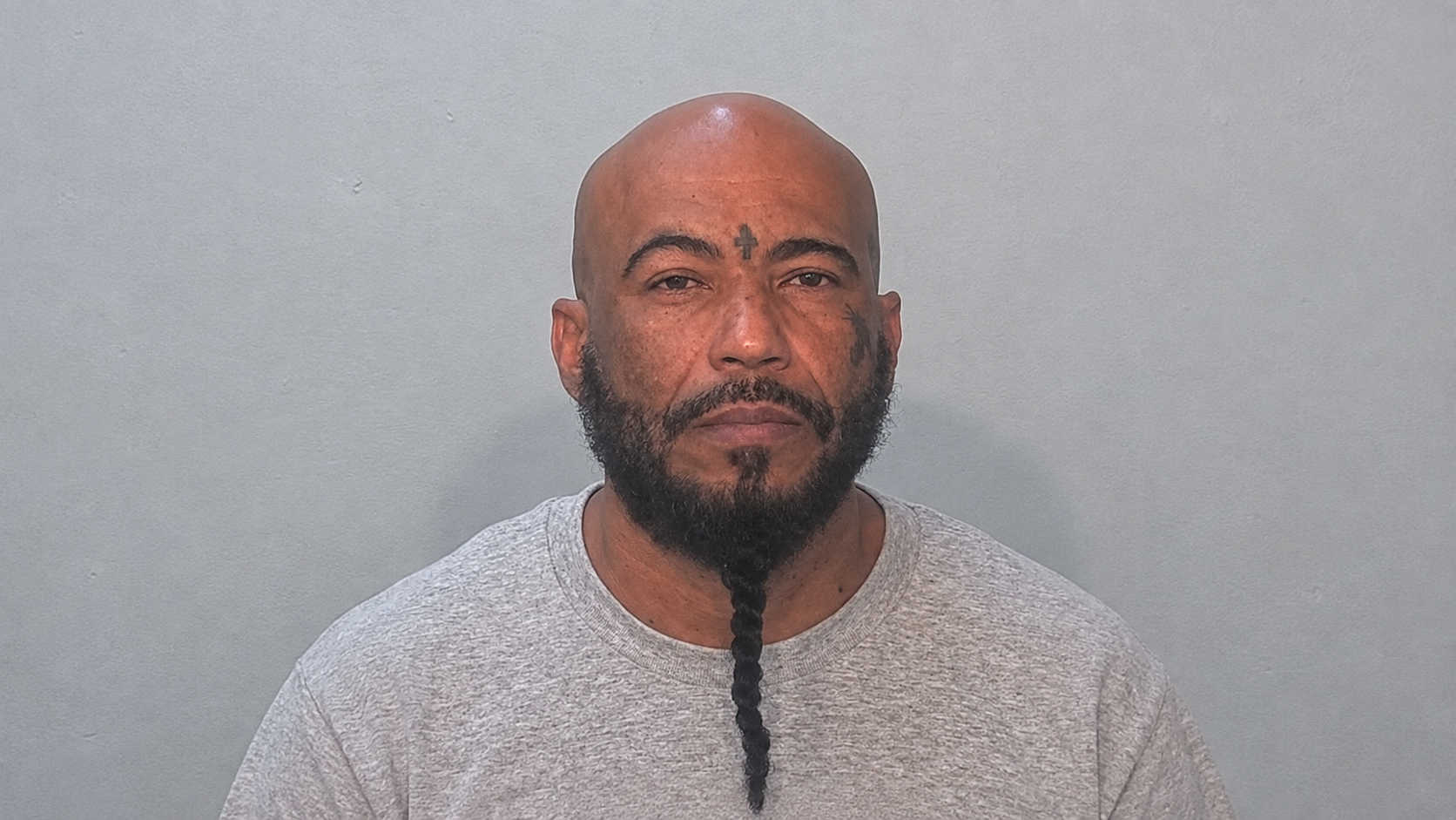 Mugshot of Alexander Burgos Matos.