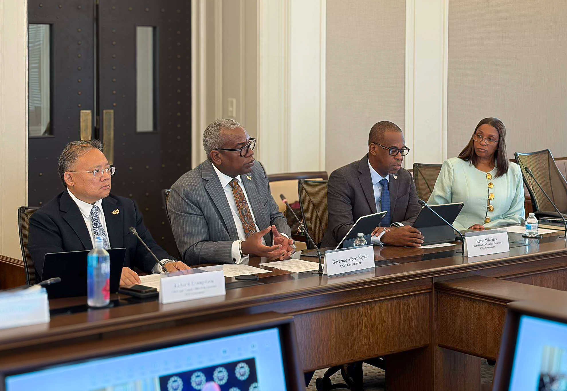 From left, Bryan's chief legal counsel Ricky Evangelista, Governor Bryan, chief of staff Kevin Williams, and Teri Helenese, who last served as director of State-Federal Relations and the administration's Washington representative,