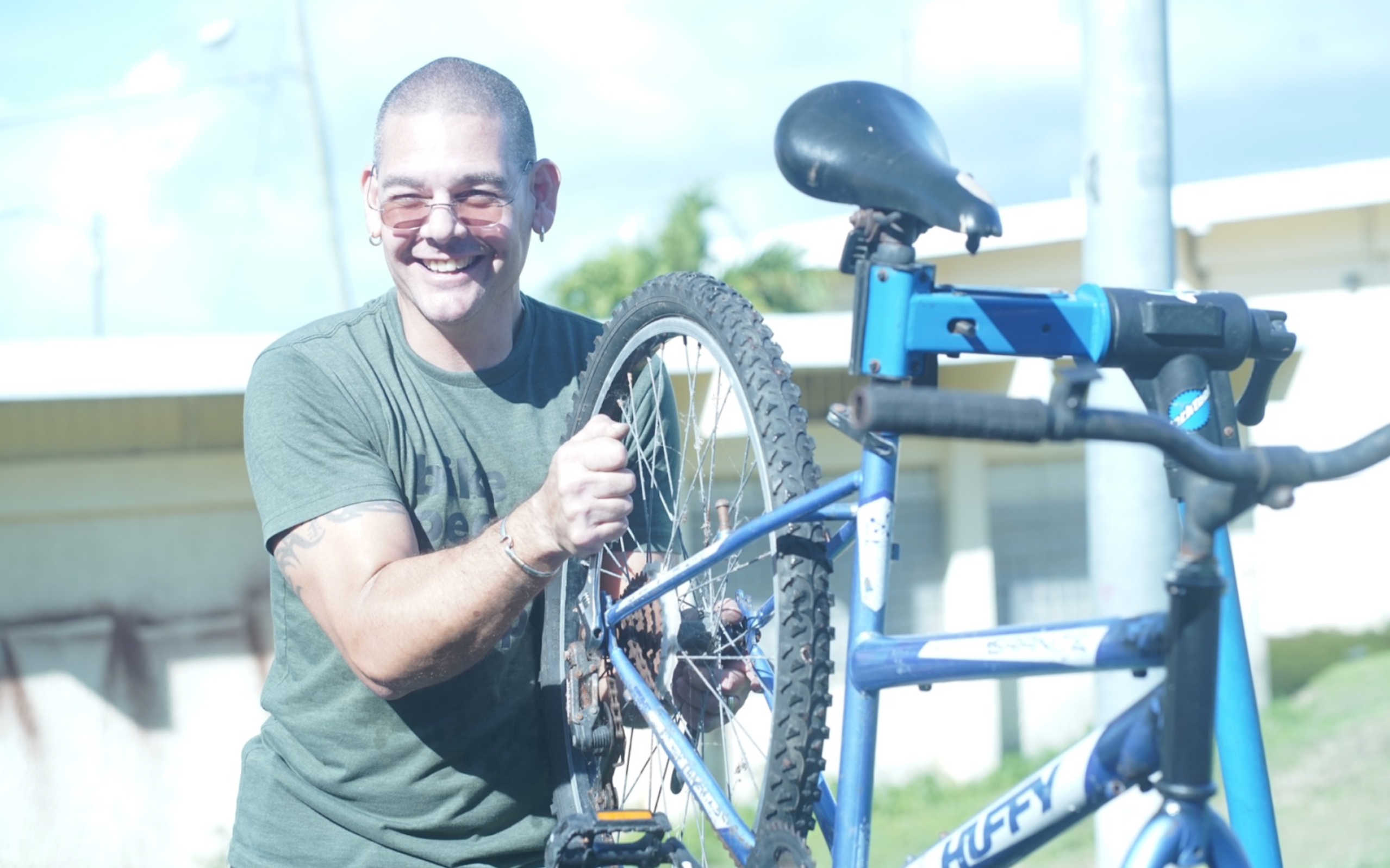 Community Bike Clinic Repairs 21 Bikes for Aureo Diaz Heights Youth