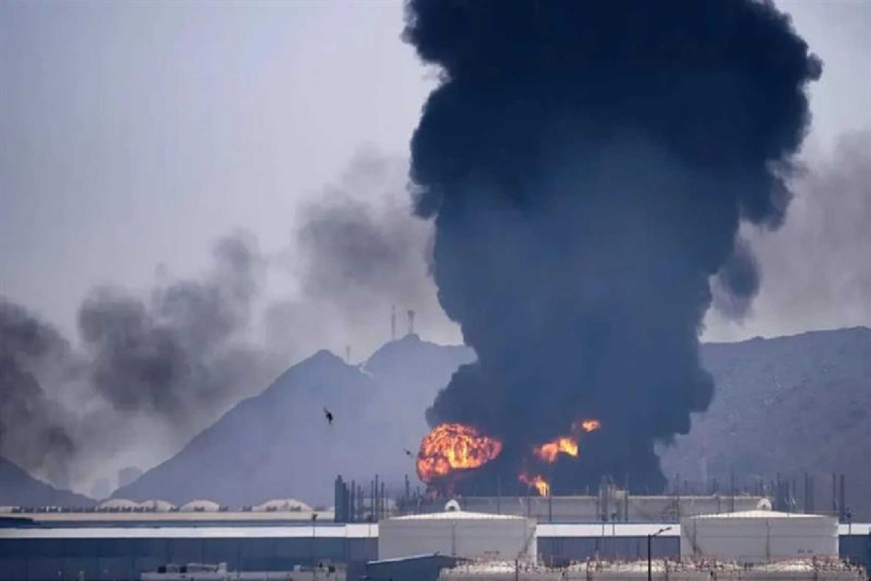 Flames and thick smoke billow over an oil facility in Fujairah, United Arab Emirates, after wreckage from an Iranian drone intercepted earlier this month fell onto the site.