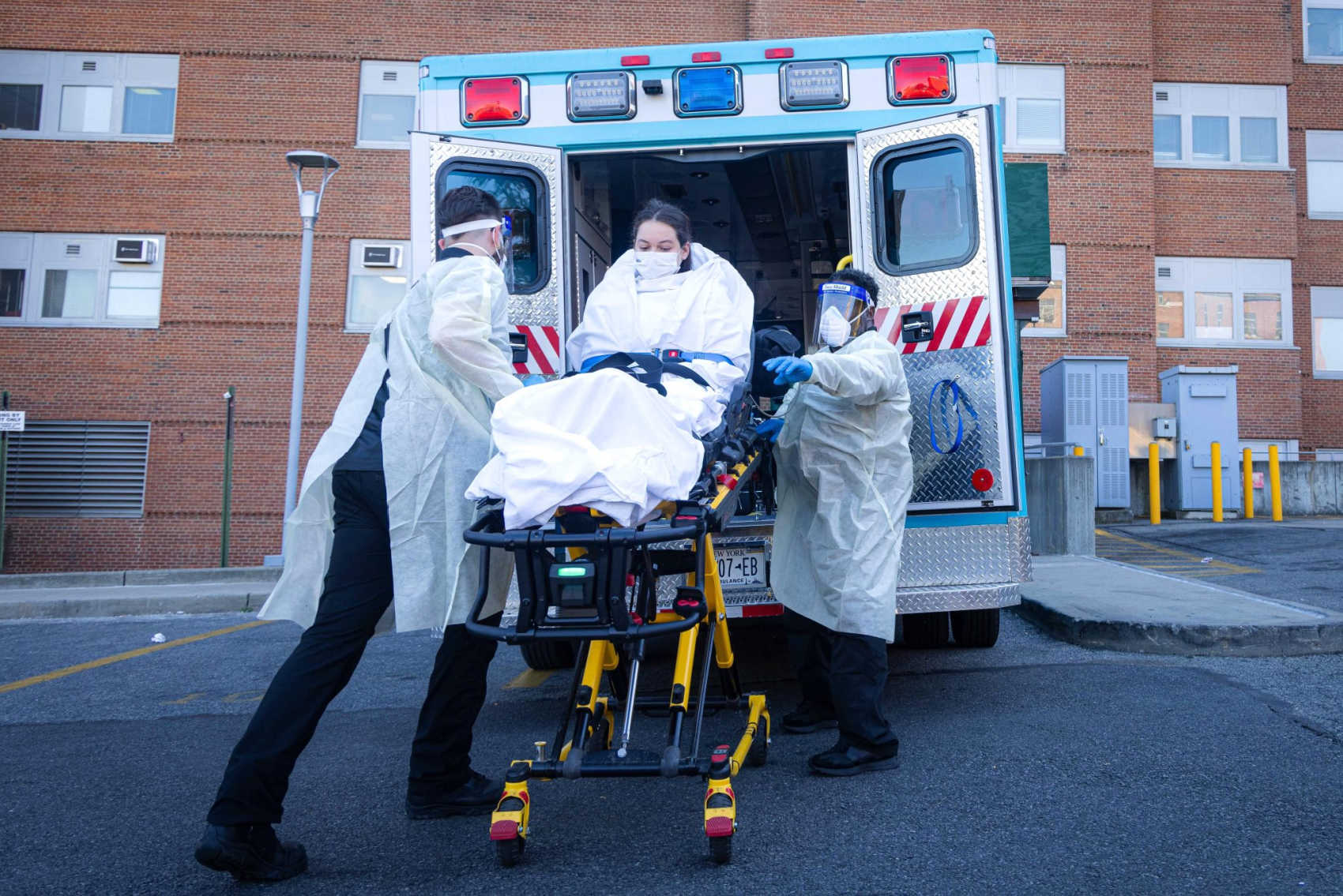 Healthcare workers in full protective gear participate in an H5N1 bird-flu preparedness exercise. The CDC later conducted three unannounced avian-flu drills at USVI healthcare sites.