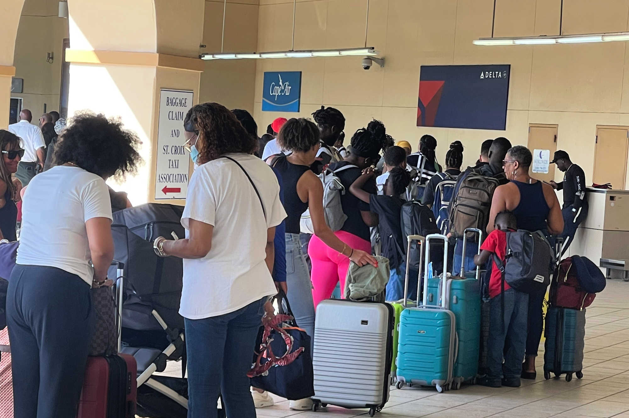 Long lines snaked the Henry E. Rohlsen Airport on Tuesday, Jan. 9, 2024 with passengers heading off island.