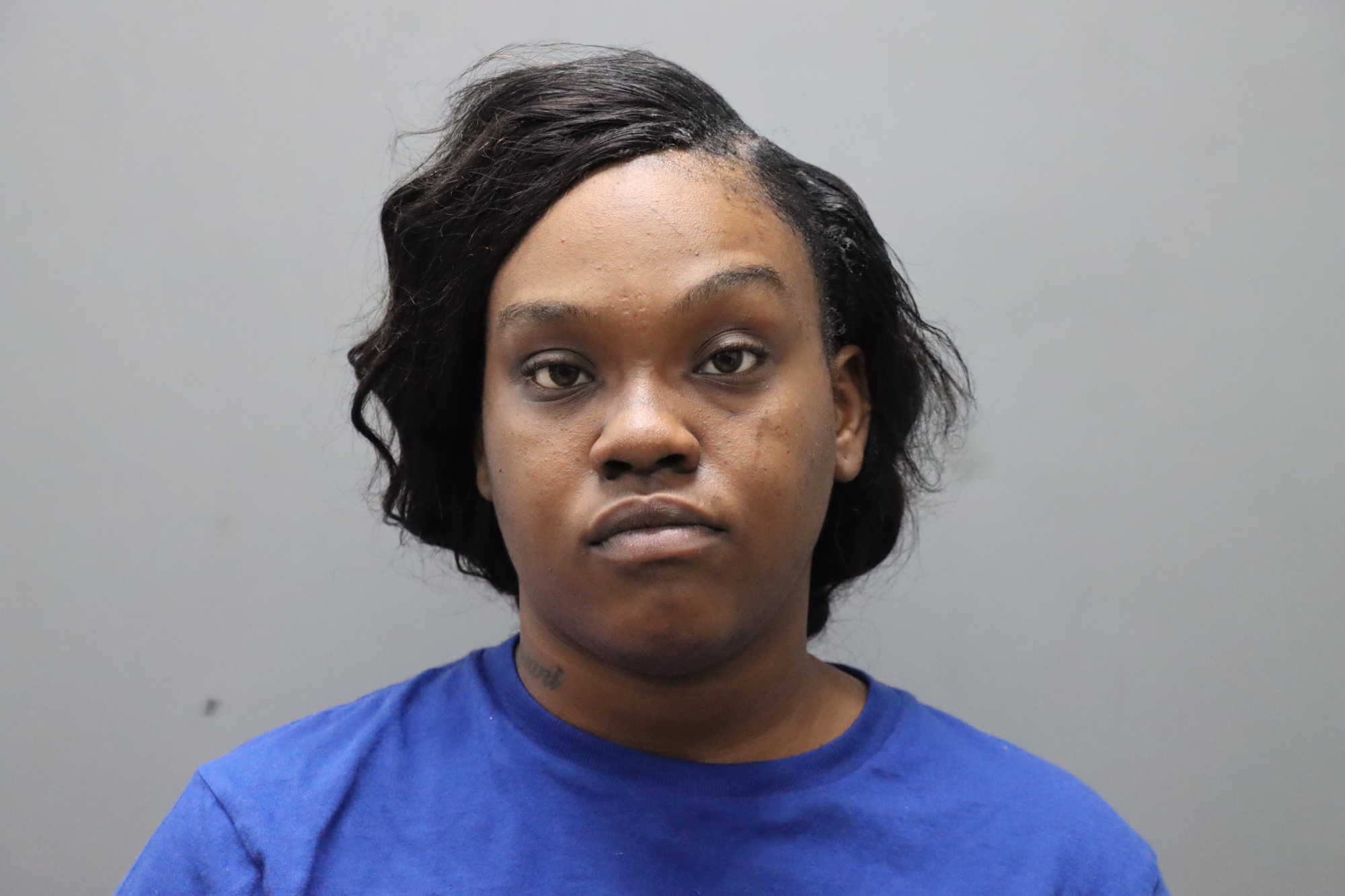 Woman Charged Wit...