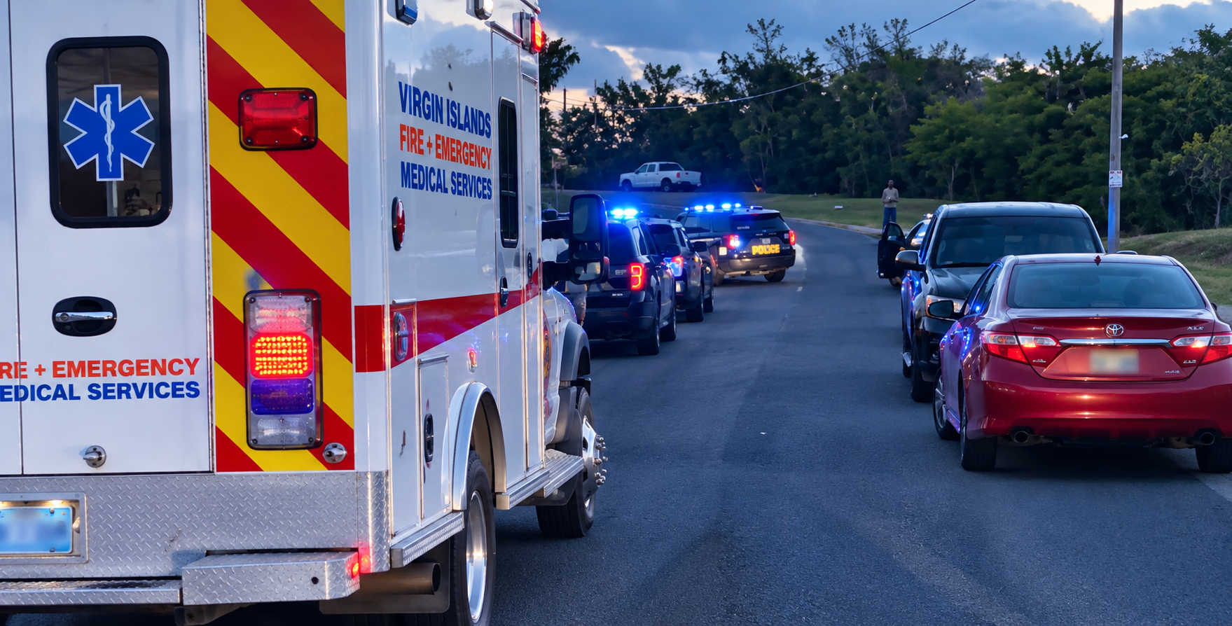 VIFEMS and VIPD units respond to the Profit Hills shooting on St. Croix, where a man was critically wounded Thursday evening and taken to Juan F. Luis Hospital.