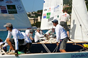 The USVI’s Peter Holmberg, right (facing) and his team in close competition during the 2013 CAMR.