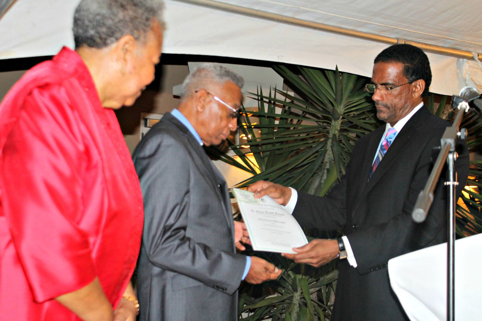 BVI Government Bestows Honorary Belonger Status On Father Ronald Branche And Wife