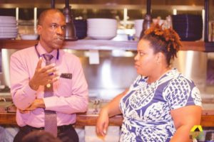 Agriculture Commissioner Carlos Robles and Sommer Sibilly-Brown interact at open house event. (Credit: Chalana Brown)