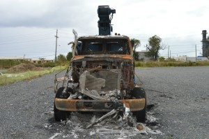Torched crane at a WAPA parking lot for VITOL employees in Christiansted