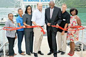 (Left to Right) Former President Emerita Dr. LaVerne Ragster, Provost and Vice President of Academic Affairs Dr. Camille McKayle, Vice President of Administration and Finance Shirley Lake King, Director of the CMES and associate professor of Marine Biology Dr. Paul Jobsis, UVI President David Hall and UVI Professor Dr. Richard Nemeth assist with the cutting ribbon at UVI’s new dock.