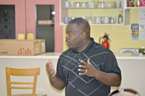 Pastor Dexter Skepple speaking to men about his vision for the all-men effort.