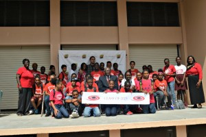 Six grade Juanita Gardin Elementary School students pose for a picture with Dr. David Hall, president of UVI