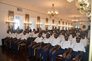 Thirty-three new peace officers take the oath of office at a Government House ceremony in Christiansted in Monday.