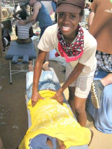 Brittany Valmond doing chiropractic work on a mission trip to Haiti.