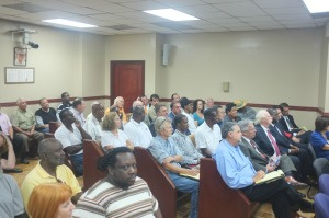 Private citizens listen to testimonies of ABR VI and Monarch Energy Partners.