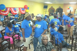 Christensen supporters await her arrival at the campaign's St. Croix headquarters in Barren Spot.