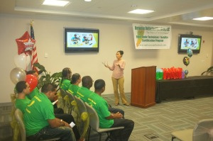Senator Nellie Rivera O'Reilly speaking at the Netwave Unlimited Services graduation.