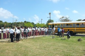 Students boarding school buses as they leave Man Up Conference 2015