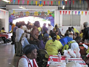 Volunteers providing an array of services to St. Croix's homeless residents inside the Rudolph Schulterbrandt Market Building.