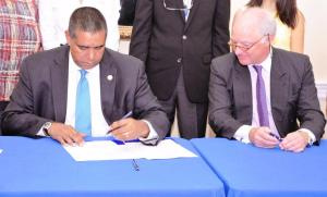 Governor de Jongh signing Water Island hotel development lease.