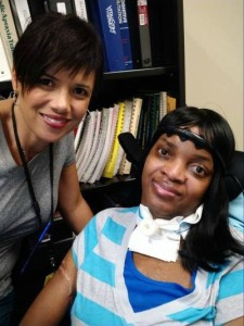 Diana Isidore, right, pose for a pic with an assistant.