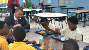 Sen. Jean Forde eats with students of Joseph Gomez Elementary School