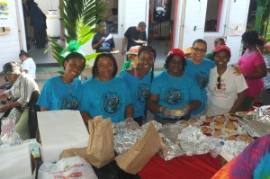 Scotia Bank employees serving breakfast.