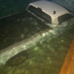 White pickup truck submerged in the sea near the Frederiksted Fish Market on Wednesday morning.