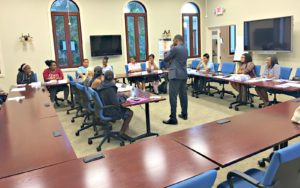 I.C.M.C. coaches provide students with valuable feedback (Credit: I.C.M.C.)