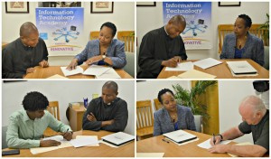 Innovative and St. Joseph High School executives sign memorandum of agreement.